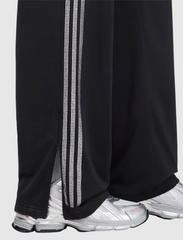 SP5DER RHINESTONE TRACKPANT
