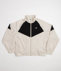 Nike SB Pavan Track Jacket - Light Orewood Brown / Black / Black / White