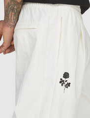 WOVEN TRACK PANTS